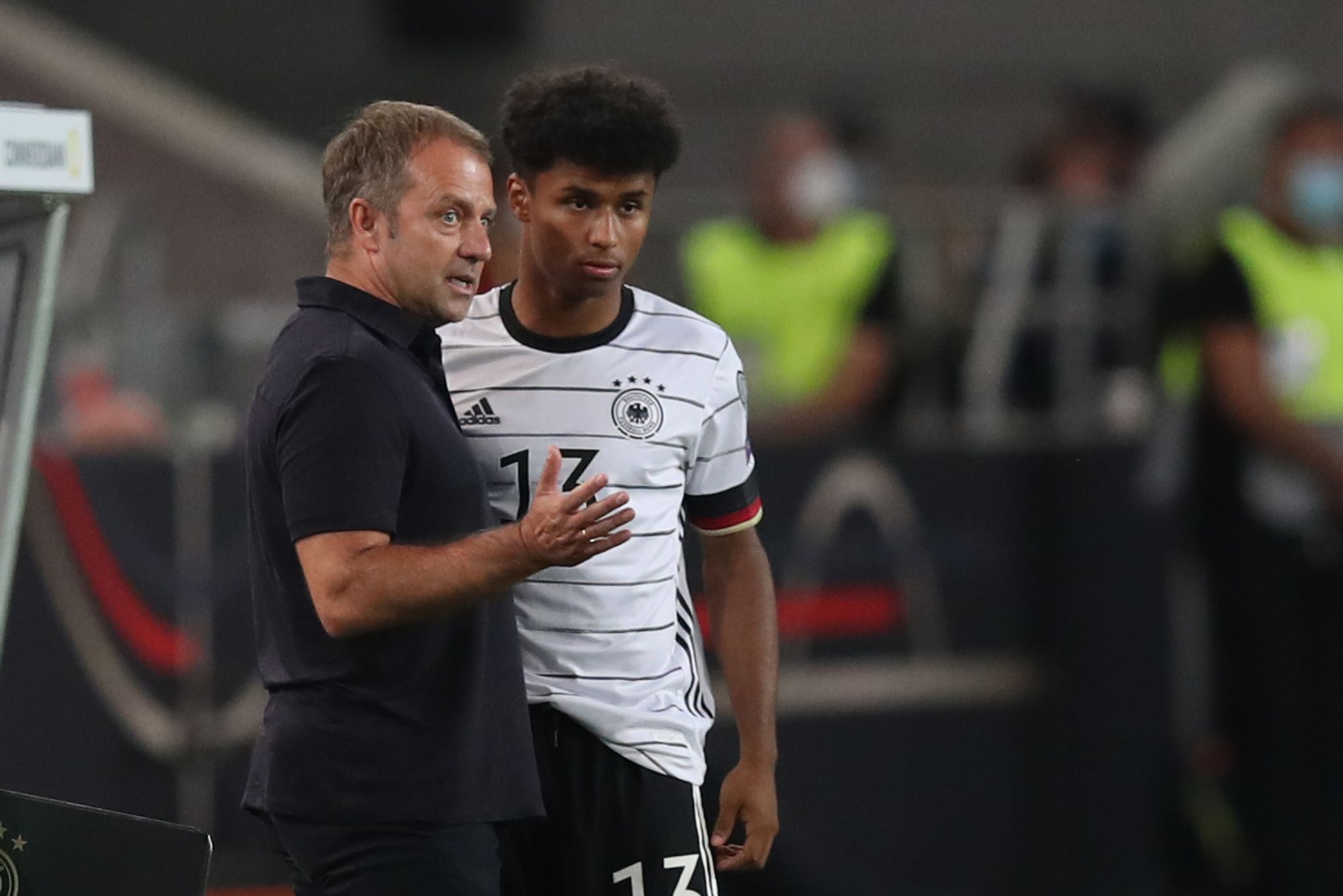 Hansi Flick (l) und Karim Adeyemi